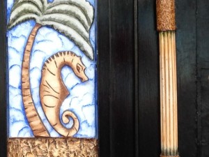 Seahorse detail in a door.