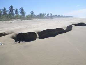The waves were carving out the beach.