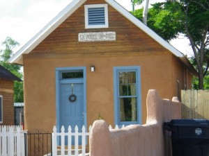 The sign above the door says, in French, "the door of heaven."